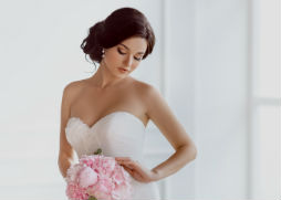 Oval face shape hair style wedding hair side curled bun