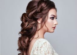 Square hair style brides hair back with loose curls